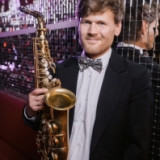 Саксофонист Алексей Молев 